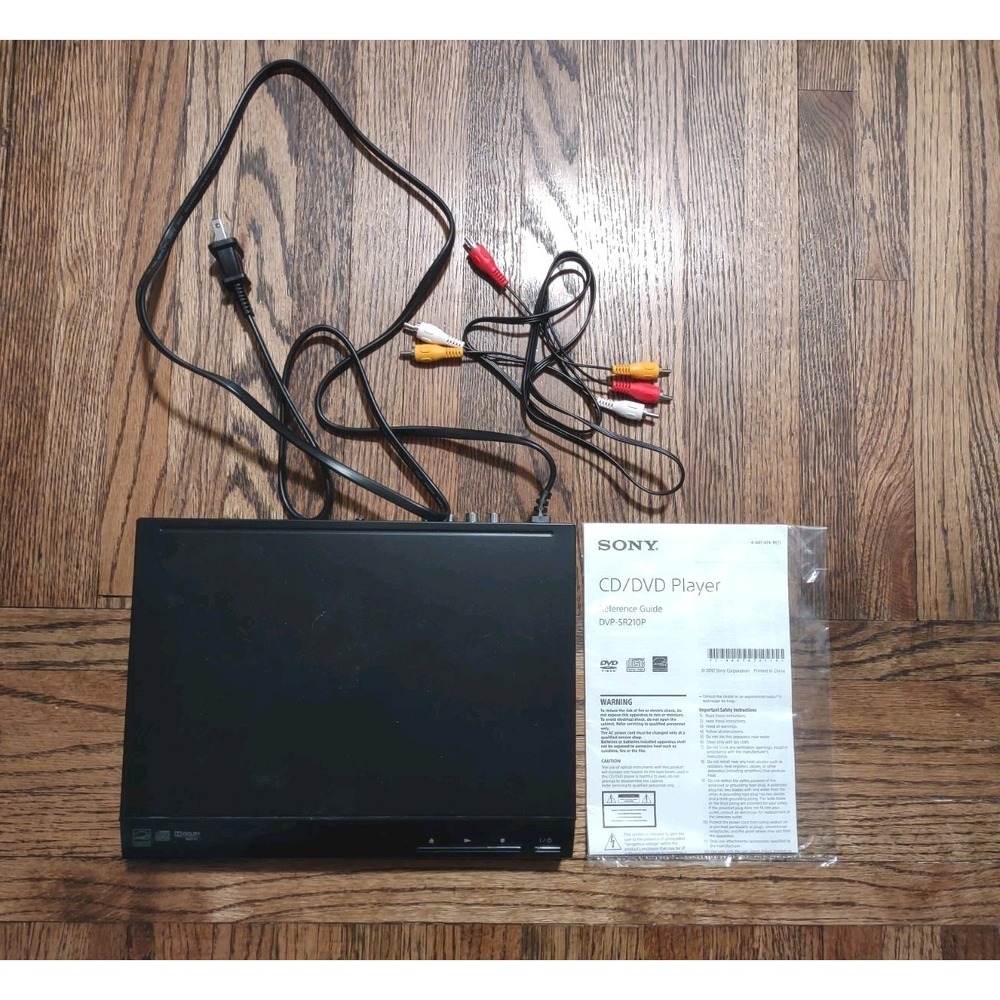 Sony DVP-SR210P Ultra Slim CD/DVD Player - Powers On / Ejects Includes Manual